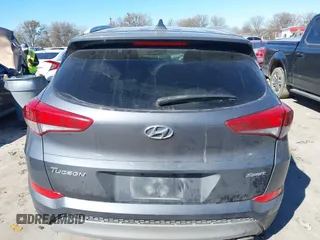 2018 Hyundai Tucson Sport with VIN KM8J33AL5JU770092, listed as a IAAI auction lot 41395349 with 101,395 mi miles. Bid and sale history available at carsss.com. Image 17.