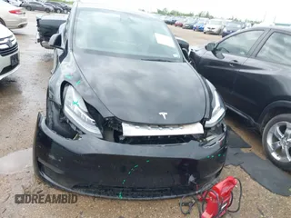 2023 Tesla Model Y Long Range with VIN 7SAYGDEE3PA024315, listed as a IAAI auction lot 41900788 with Not Provided miles. Bid and sale history available at carsss.com. Image 18.