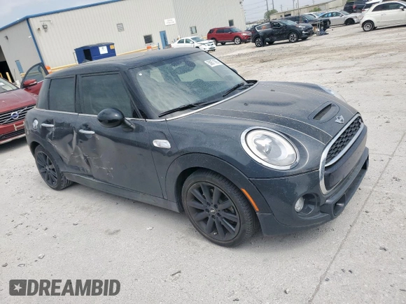 2016 MINI Hardtop 4 Door S with VIN WMWXU3C52G2D30894, listed as a Copart auction lot 50871865 with Not provided miles and Salvage title. Bid and sale history available at DreamBid. Image 4.