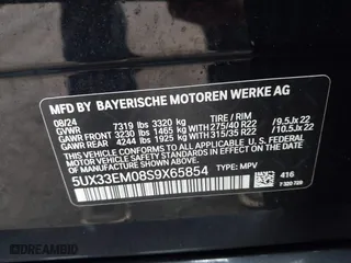 2025 BMW X7 M60i with VIN 5UX33EM08S9X65854, listed as a IAAI auction lot 41689675 with 2,595 mi miles. Bid and sale history available at carsss.com. Image 9.