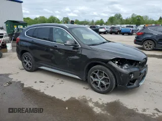 2018 BMW X1 xDrive28i z VIN WBXHT3C33J5F89718, wystawiony jako Copart lot #57726835 z przebiegiem 120 592 mil mil oraz Szkody całkowita. Historia ofert i sprzedaży dostępna na DreamBid. Obrazek 4.