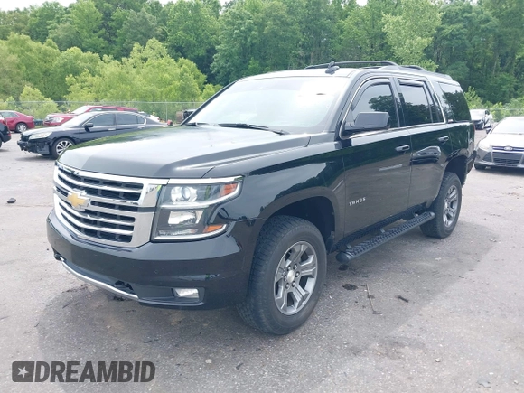 2017 Chevrolet Tahoe LT z VIN 1GNSKBKC8HR311969, wystawiony jako IAAI lot #42126414 z przebiegiem 160 994 mil mil oraz . Historia ofert i sprzedaży dostępna na DreamBid. Obrazek 2.