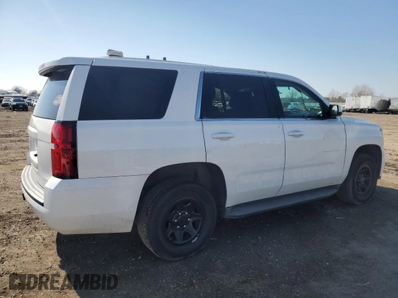 2015 Chevrolet Tahoe Commercial with VIN 1GNLC2EC2FR571987, listed as a Copart auction lot 45346895 with 106,708 mi miles and Salvage title. Bid and sale history available at DreamBid. Image 3.