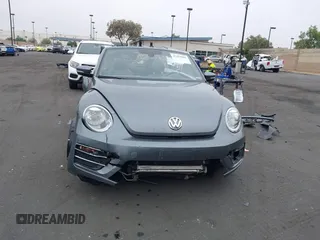2018 Volkswagen Beetle S z VIN 3VW5DAAT3JM506023, wystawiony jako IAAI lot #42414886 z przebiegiem 33 424 mil mil oraz . Historia ofert i sprzedaży dostępna na DreamBid. Obrazek 13.