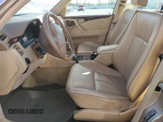 2002 Mercedes-Benz E-Class with VIN WDBJF82J12X062460, listed as a Copart auction lot 79264964 with 113,725 mi miles and Salvage Title. Bid and sale history available at carsss.com. Image 7.
