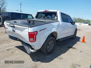 2015 Ford F-150 XL with VIN 1FTEW1CP5FKE17727, listed as a IAAI auction lot 42038024 with 142,441 mi miles. Bid and sale history available at carsss.com. Image 4.