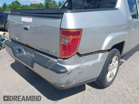 2013 Honda Ridgeline RTL with VIN 5FPYK1F51DB007236, listed as a IAAI auction lot 42762126 with 201,758 mi miles and . Bid and sale history available at DreamBid. Image 6.