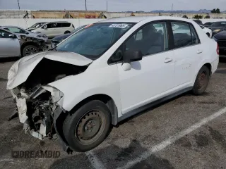 2008 Nissan Versa 1.8 S with VIN 3N1BC11E58L371074, listed as a Copart auction lot 46701965 with 49,467 mi miles and Salvage Title. Bid and sale history available at carsss.com. Image 1.