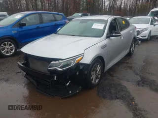 2019 Kia Optima LX with VIN 5XXGT4L31KG348622, listed as a IAAI auction lot 41726487 with 100,286 mi miles. Bid and sale history available at carsss.com. Image 17.