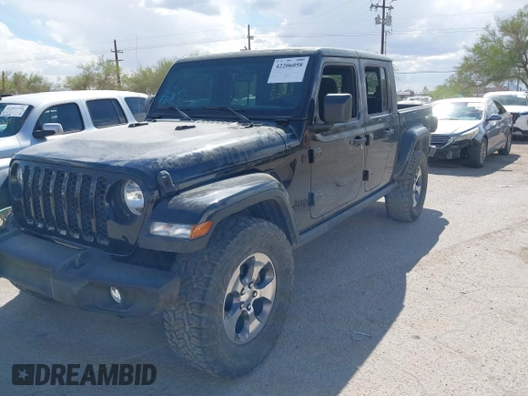 2021 Jeep Gladiator Willys with VIN 1C6HJTAG7ML523718, listed as a IAAI auction lot 42206058 with 48,071 mi miles and . Bid and sale history available at DreamBid. Image 6.