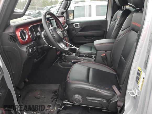 2023 Jeep Wrangler Rubicon Farout with VIN 1C4JJXFM4PW589923, listed as a Copart auction lot 48181205 with 9,814 mi miles and Salvage title. Bid and sale history available at DreamBid. Image 7.