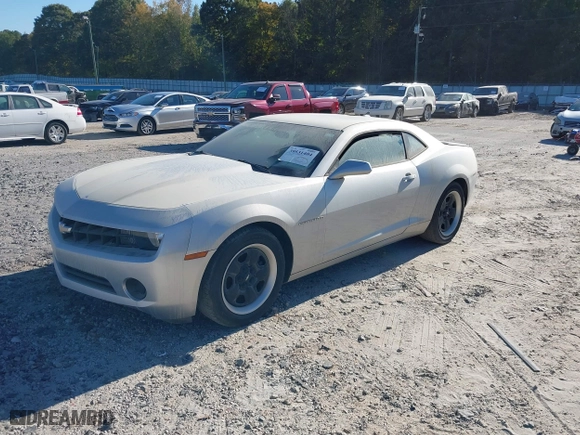 2013 Chevrolet Camaro LS with VIN 2G1FA1E36D9160663, listed as a IAAI auction lot 40649662 with 121,786 mi miles. Bid and sale history available at carsss.com. Image 2.