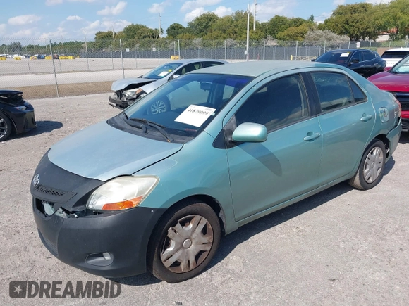 2008 Toyota Yaris with VIN JTDBT923384015057, listed as a IAAI auction lot 41879099 with 184,995 mi miles. Bid and sale history available at carsss.com. Image 2.