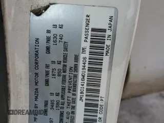 1998 Mazda Protege DX z VIN JM1BC1416W0194406, wystawiony jako Copart lot #44535955 z przebiegiem 312 942 mil mil oraz Szkoda całkowita • Salvage title. Historia ofert i sprzedaży dostępna na DreamBid. Obrazek 12.
