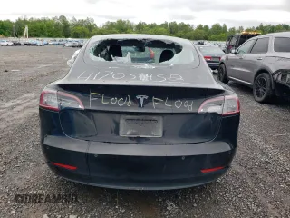 2019 Tesla Model 3 Mid Range z VIN 5YJ3E1EA0KF394514, wystawiony jako Copart lot #58051215 z przebiegiem Nie podano mil oraz Szkody całkowita. Historia ofert i sprzedaży dostępna na DreamBid. Obrazek 6.
