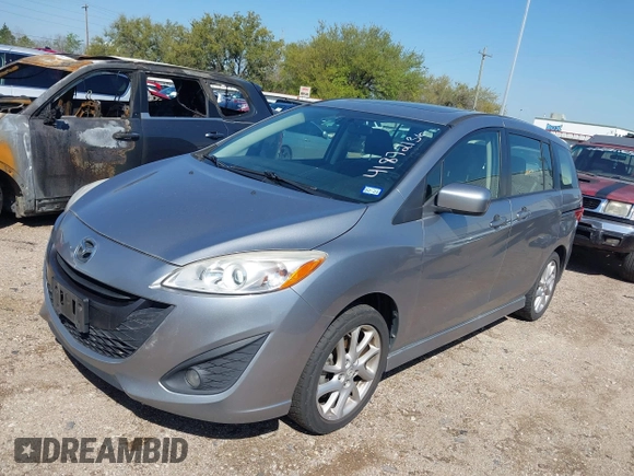 2012 Mazda Mazda5 Grand Touring with VIN JM1CW2DL2C0129518, listed as a IAAI auction lot 41872136 with 129,323 mi miles. Bid and sale history available at carsss.com. Image 2.