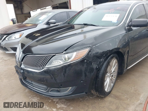 2013 Lincoln MKS EcoBoost with VIN 1LNHL9FT2DG604724, listed as a IAAI auction lot 41428420 with 152,880 mi miles and . Bid and sale history available at DreamBid. Image 6.
