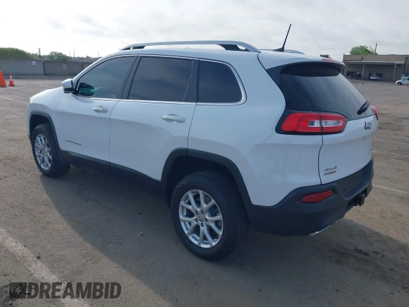 2016 Jeep Cherokee Latitude with VIN 1C4PJMCS1GW185442, listed as a IAAI auction lot 42033699 with 123,306 mi miles. Bid and sale history available at carsss.com. Image 3.