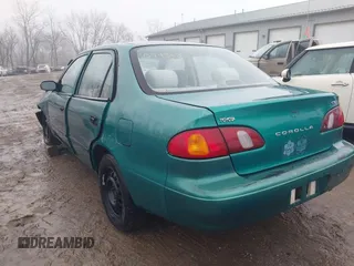 1998 Toyota Corolla VE with VIN 1NXBR12E6WZ094363, listed as a IAAI auction lot 41465384 with 265,919 mi miles and . Bid and sale history available at DreamBid. Image 3.