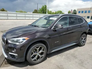 2017 BMW X1 xDrive28i with VIN WBXHT3C3XH5F76118, listed as a Copart auction lot 55902394 with 121,445 mi miles and Salvage title. Bid and sale history available at DreamBid. Image 1.