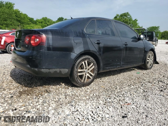 2009 Volkswagen Jetta S z VIN 3VWJM71K39M165677, wystawiony jako Copart lot #56901665 z przebiegiem 202 632 mil mil oraz Czysty tytuł • Clean title. Historia ofert i sprzedaży dostępna na DreamBid. Obrazek 3.
