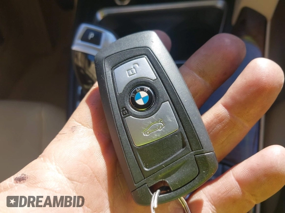 2015 BMW 3 Series 320i xDrive with VIN WBA3C3C50FK201906, listed as a IAAI auction lot 41287902 with 77,726 mi miles and . Bid and sale history available at DreamBid. Image 11.