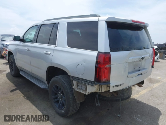 2018 Chevrolet Tahoe LT with VIN 1GNSCBKC1JR148374, listed as a IAAI auction lot 42247479 with 90,550 mi miles and . Bid and sale history available at DreamBid. Image 3.