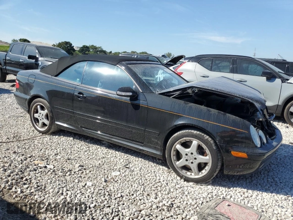 2002 Mercedes-Benz CLK 55 AMG with VIN WDBLK74GX2T093407, listed as a Copart auction lot 42974935 with 123,941 mi miles and Salvage Title. Bid and sale history available at DreamBid. Image 4.