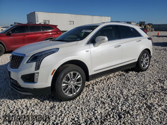 2022 Cadillac XT5 FWD Premium Luxury with VIN 1GYKNCRS1NZ125487, listed as a Copart auction lot 42081675 with 67,702 mi miles and Salvage title. Bid and sale history available at DreamBid. Image 1.