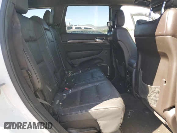 2014 Jeep Grand Cherokee Summit with VIN 1C4RJFJTXEC134150, listed as a Copart auction lot 61859265 with 159,262 mi miles and Salvage title. Bid and sale history available at DreamBid. Image 11.