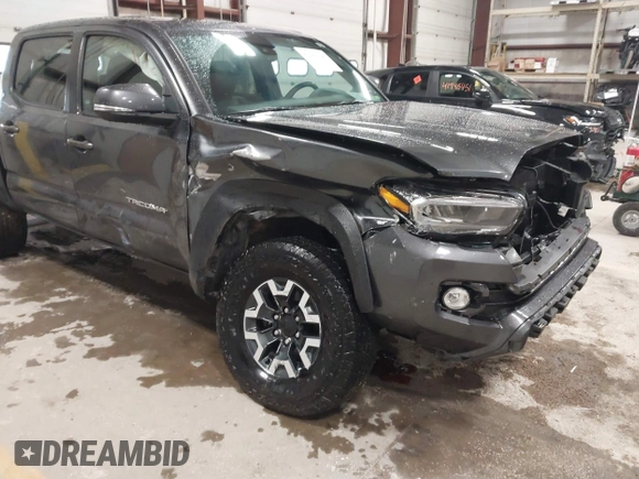2021 Toyota Tacoma SR z VIN 3TMCZ5AN2MM444249, wystawiony jako IAAI lot #41942146 z przebiegiem 59 429 mil mil oraz . Historia ofert i sprzedaży dostępna na DreamBid. Obrazek 6.
