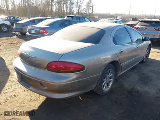 2000 Chrysler LHS with VIN 2C3HC56G4YH222936, listed as a IAAI auction lot 41453912 with 202,102 mi miles. Bid and sale history available at carsss.com. Image 4.