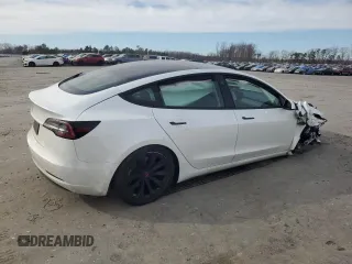 2021 Tesla Model 3 Standard Range Plus with VIN 5YJ3E1EA6MF048261, listed as a Copart auction lot 48680315 with Not Provided miles and Salvage Title. Bid and sale history available at DreamBid. Image 3.