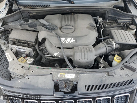 2014 Jeep Grand Cherokee Overland with VIN 1C4RJECG1EC556155, listed as a Copart auction lot 75641034 with 116,549 mi miles and Salvage Title. Bid and sale history available at carsss.com. Image 12.