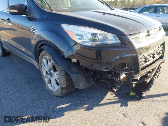 2016 Ford Escape Titanium with VIN 1FMCU0JX3GUA90420, listed as a IAAI auction lot 41850537 with 115,770 mi miles. Bid and sale history available at carsss.com. Image 17.