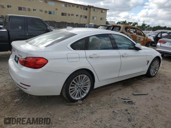 2015 BMW 4 Series 428i xDrive with VIN WBA4C9C53FG135314, listed as a Copart auction lot 82090253 with 93,188 mi miles and . Bid and sale history available at DreamBid. Image 3.