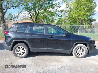 2014 Jeep Cherokee Sport with VIN 1C4PJLAB4EW110051, listed as a IAAI auction lot 41961698 with 153,570 mi miles and . Bid and sale history available at DreamBid. Image 13.