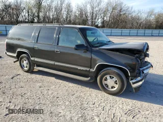 1999 Chevrolet Suburban with VIN 3GNEC16R1XG263524, listed as a Copart auction lot 49686865 with 280,125 mi miles and Salvage Title. Bid and sale history available at carsss.com. Image 4.