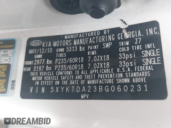 2011 Kia Sorento LX with VIN 5XYKTDA23BG060231, listed as a IAAI auction lot 42142538 with 166,884 mi miles. Bid and sale history available at carsss.com. Image 9.