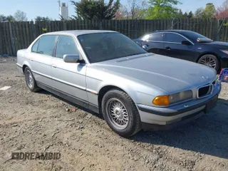 1998 BMW 7 Series 740il with VIN WBAGJ8324WDM11469, listed as a IAAI auction lot 42069641 with 1 mi miles. Bid and sale history available at carsss.com. Image 1.