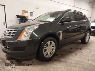 2014 Cadillac SRX with VIN 3GYFNAE34ES665630, listed as a IAAI auction lot 41315281 with 99,009 mi miles and . Bid and sale history available at DreamBid. Image 17.