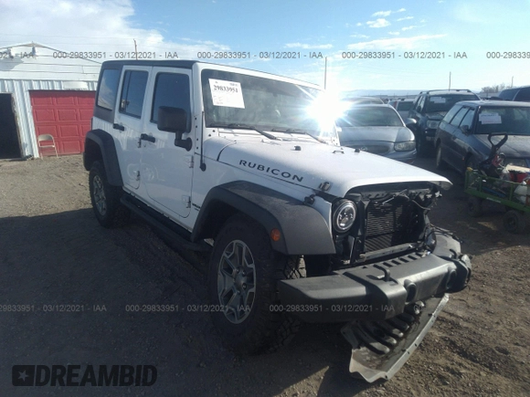2013 Jeep Wrangler Unlimited Rubicon 10th Anniversary with VIN 1C4HJWFG0DL681417, listed as a IAAI auction lot 29833951 with 118,673 mi miles and . Bid and sale history available at DreamBid. Image 1.