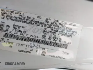 2012 Ford Focus SEL with VIN 1FAHP3H20CL470527, listed as a IAAI auction lot 42028826 with 165,197 mi miles. Bid and sale history available at carsss.com. Image 9.