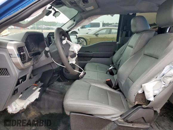2023 Ford F-150 XL z VIN 1FTEX1C56PKF09894, wystawiony jako Copart lot #60458395 z przebiegiem 65 615 mil mil oraz Szkoda całkowita • Salvage title. Historia ofert i sprzedaży dostępna na DreamBid. Obrazek 7.
