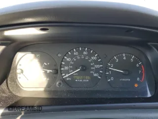 2000 Toyota Camry CE z VIN 4T1BG22K0YU692937, wystawiony jako Copart lot #57456985 z przebiegiem 116 617 mil mil oraz Szkoda całkowita • Salvage title. Historia ofert i sprzedaży dostępna na DreamBid. Obrazek 9.