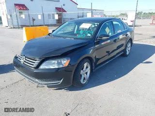 2013 Volkswagen Passat SE w/Sunroof with VIN 1VWBP7A3XDC113767, listed as a IAAI auction lot 41987892 with 112,748 mi miles. Bid and sale history available at carsss.com. Image 2.