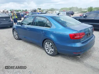 2015 Volkswagen Jetta SE with VIN 3VWD17AJ6FM231597, listed as a IAAI auction lot 42718275 with Not provided miles and . Bid and sale history available at DreamBid. Image 3.