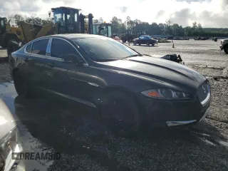 2014 Jaguar XF SC with VIN SAJWJ0EF0E8U31601, listed as a Copart auction lot 57146535 with 180,408 mi miles and Clean Title. Bid and sale history available at DreamBid. Image 4.