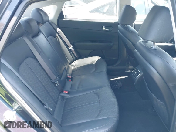 2018 Kia Optima EX with VIN KNAGU4LE6J5020594, listed as a IAAI auction lot 42118299 with 65,482 mi miles and . Bid and sale history available at DreamBid. Image 8.
