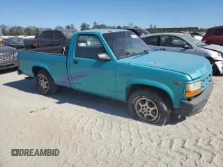 1996 Dodge Dakota with VIN 1B7FL26X9TW706385, listed as a Copart auction lot 77003174 with 146,228 mi miles and Salvage Title. Bid and sale history available at carsss.com. Image 4.